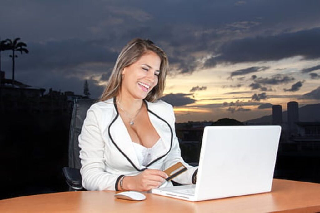  A woman shopping online with a credit card 