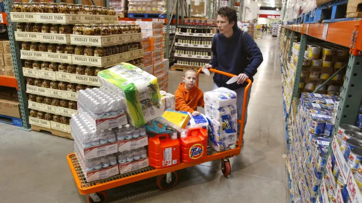 Chicago resident and her son shop at Costco with a large grocery cart