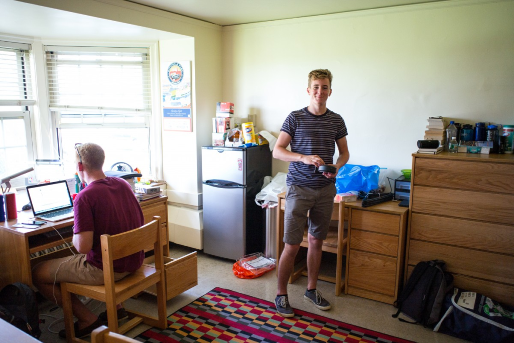 A freshman settling into his new hostel