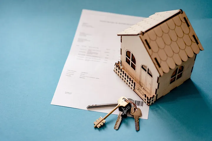 3-D cut-out house with keys