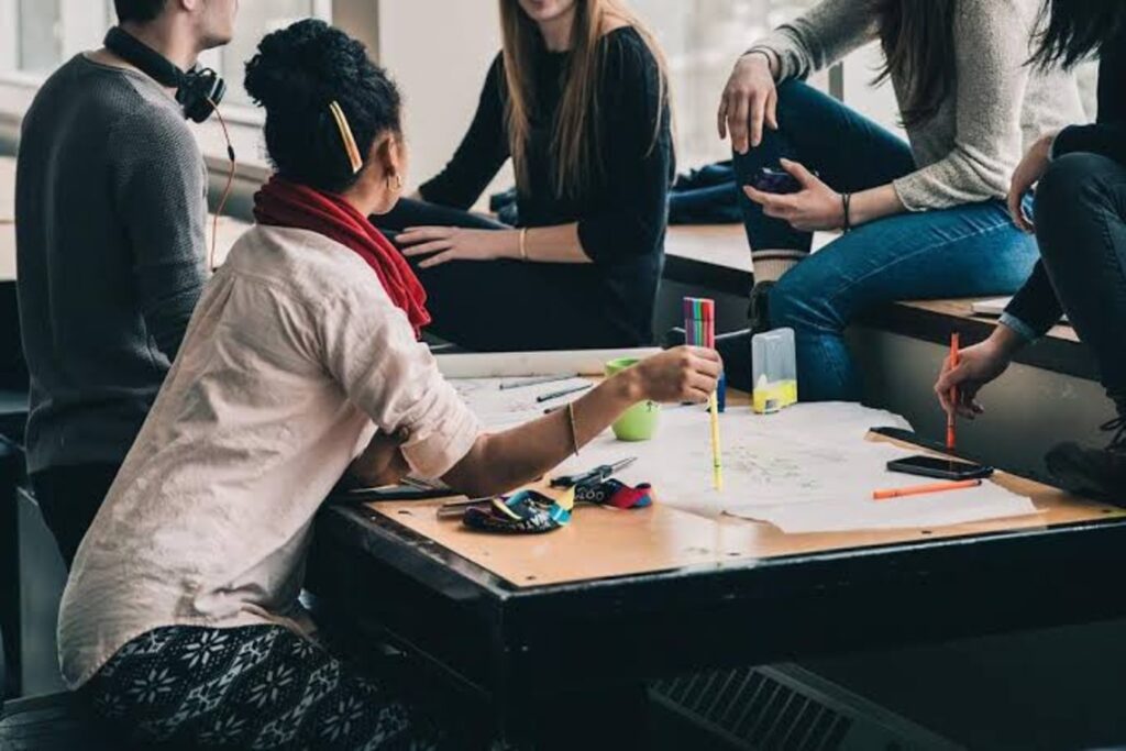 A group of youths at a brainstorming session