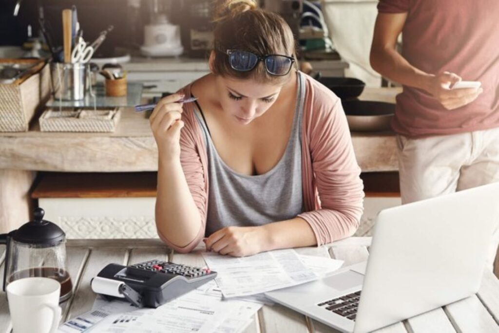 A woman working on her tax returns