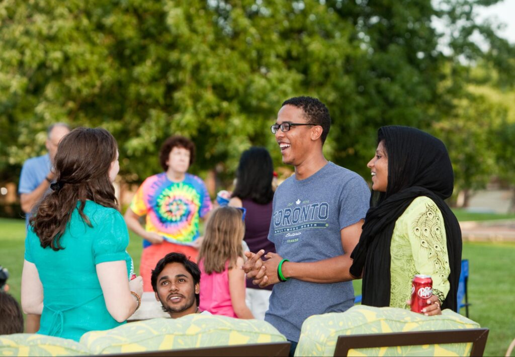 Multiracial college students chatting