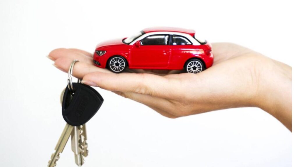 Red model car and car keys