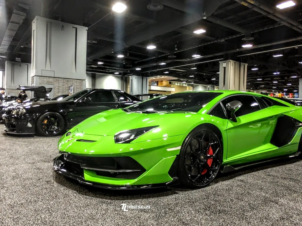 A lemon green sports car in a collection