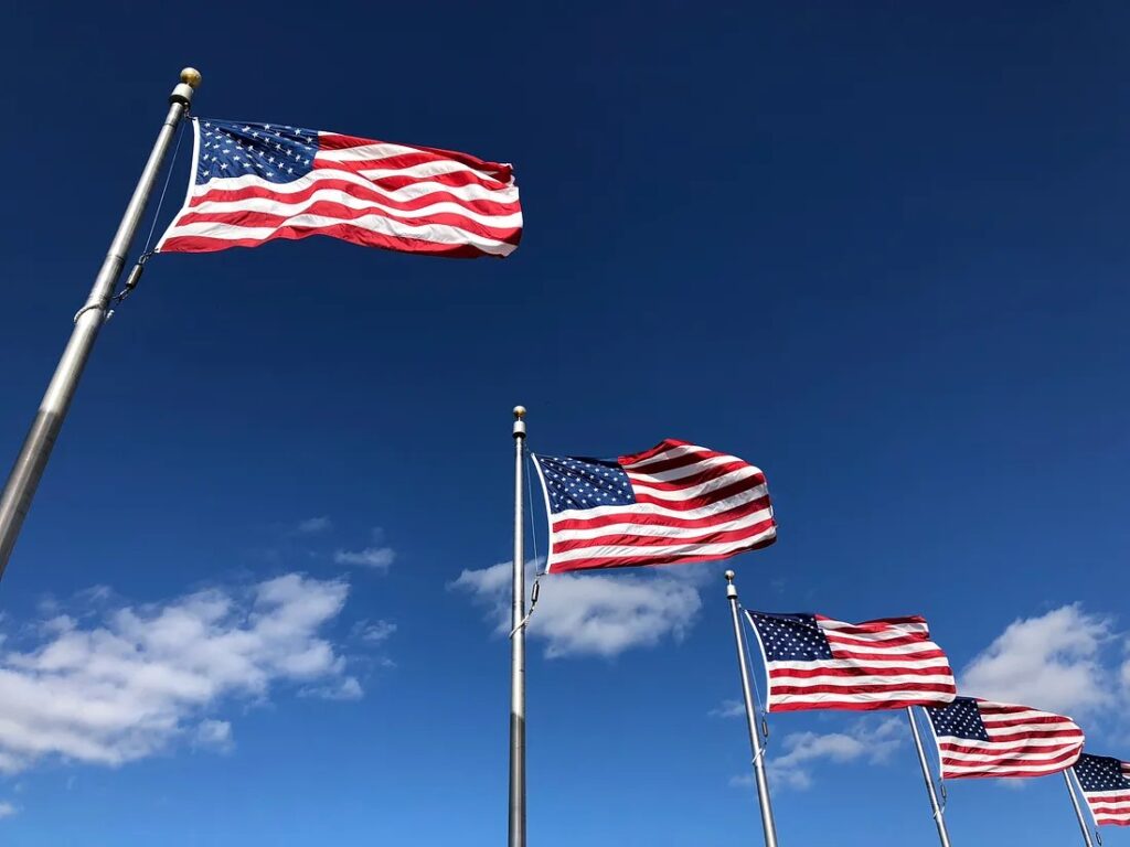 Flags of the USA flying in the wind
