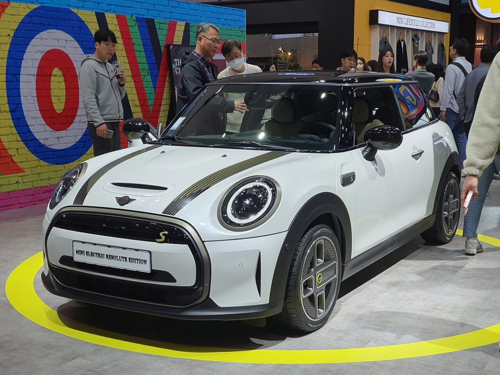 The unveiling of an EV Mini Cooper at an Asian showroom