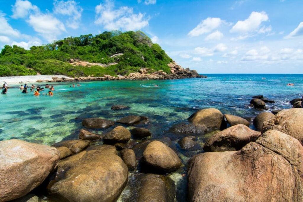 Locals splashing at a Sri Lankan beach