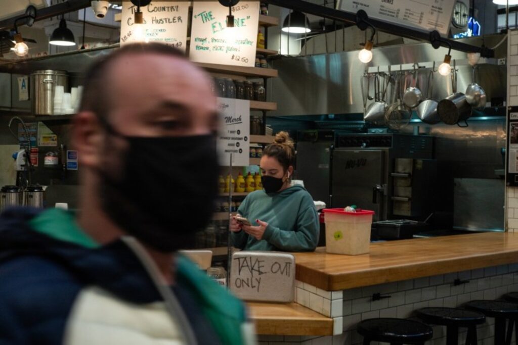 A server at Wexler's Deli