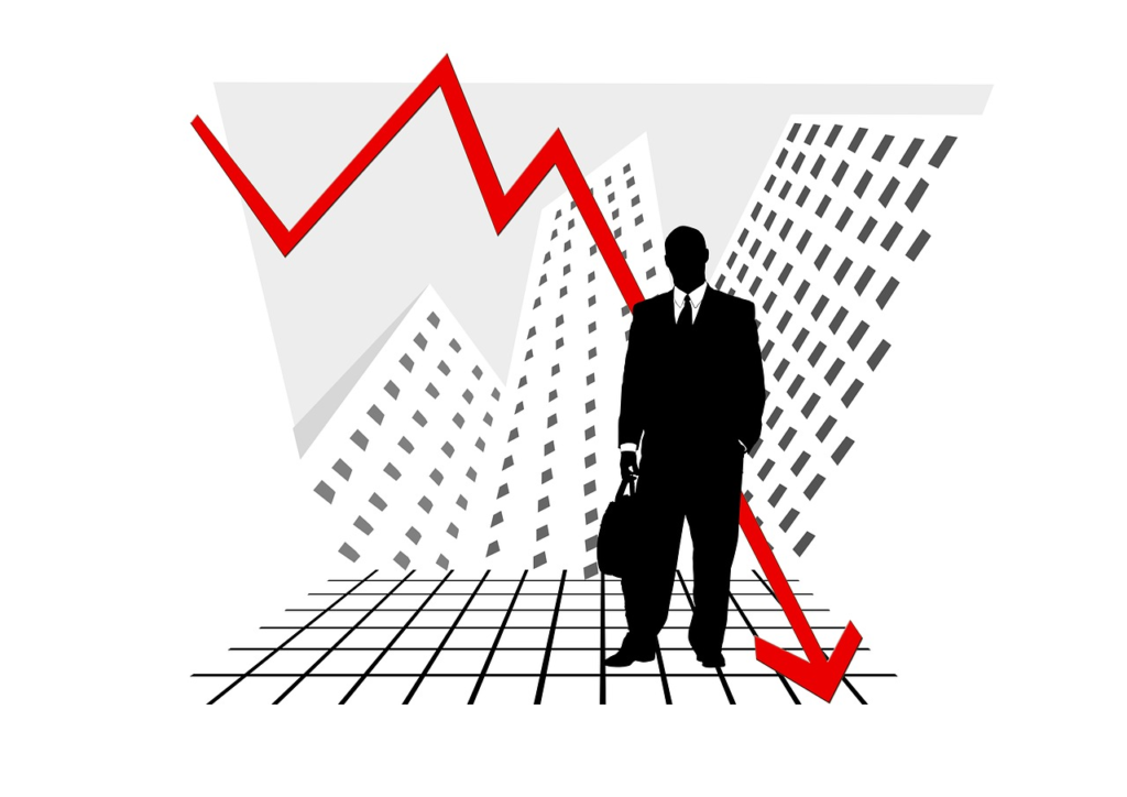 A clipart showing a businessman in the middle of a downturn