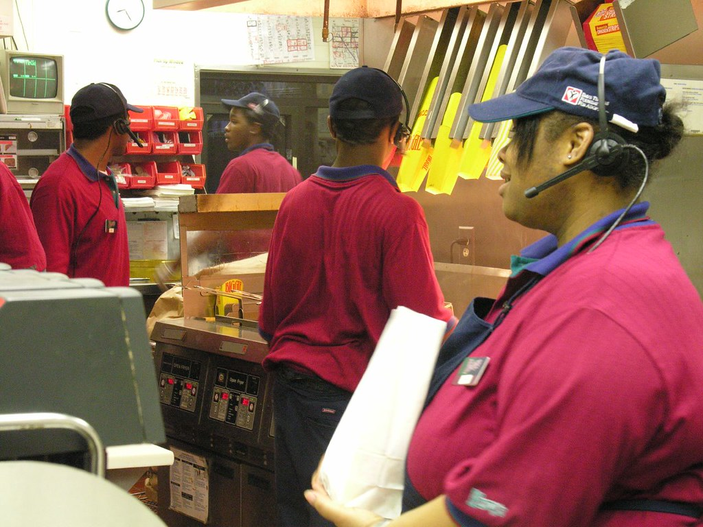 Fast-food workers taking orders