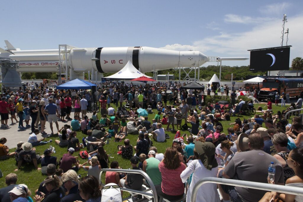 Crowd watching the total eclipse at a NASA complex