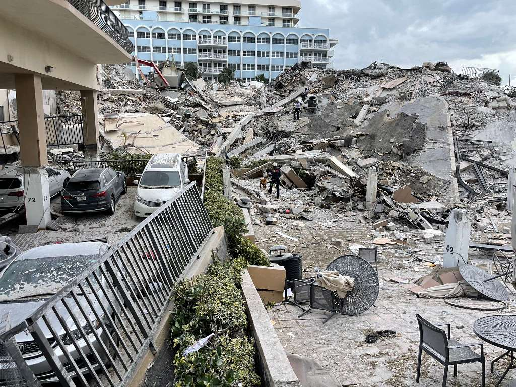 Ground view of partially collapsed Champlain Towers