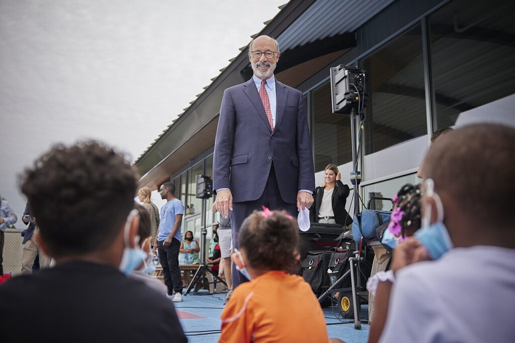 Tom Wolf greets students at Crispus Attucks