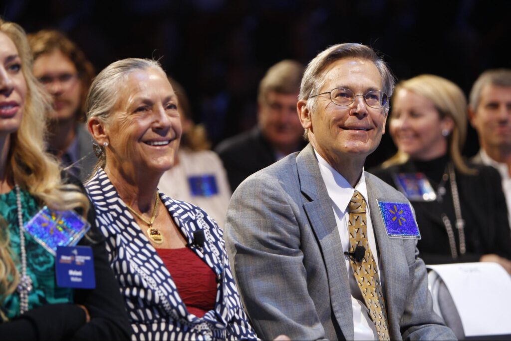 Alice and Jim Walton at a Walmart shareholders meeting