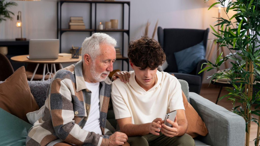 Medium short man and boy with a phone