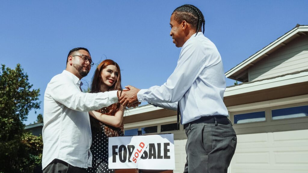 Man shaking hands with realtor