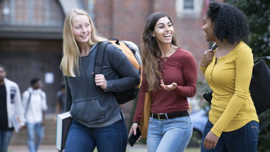 Three college students chatting