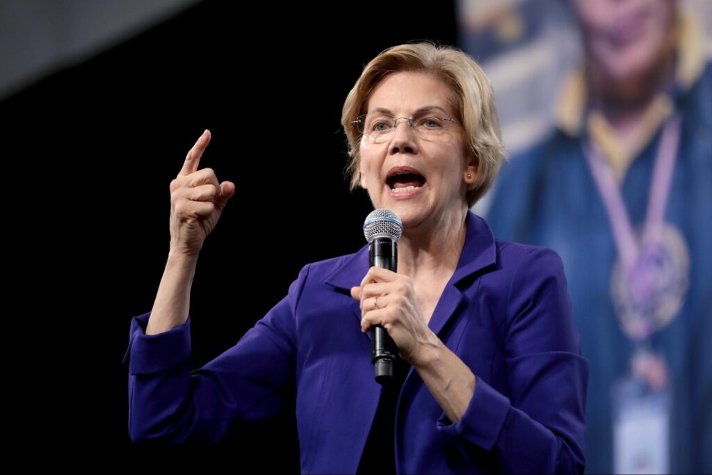 Warren speaking with attendees at the 2019 National Forum on Wages and Working People