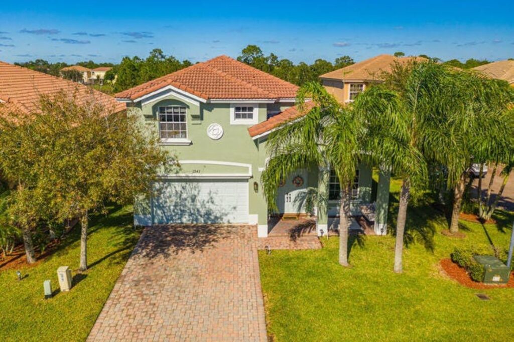 Family House with Palm Trees