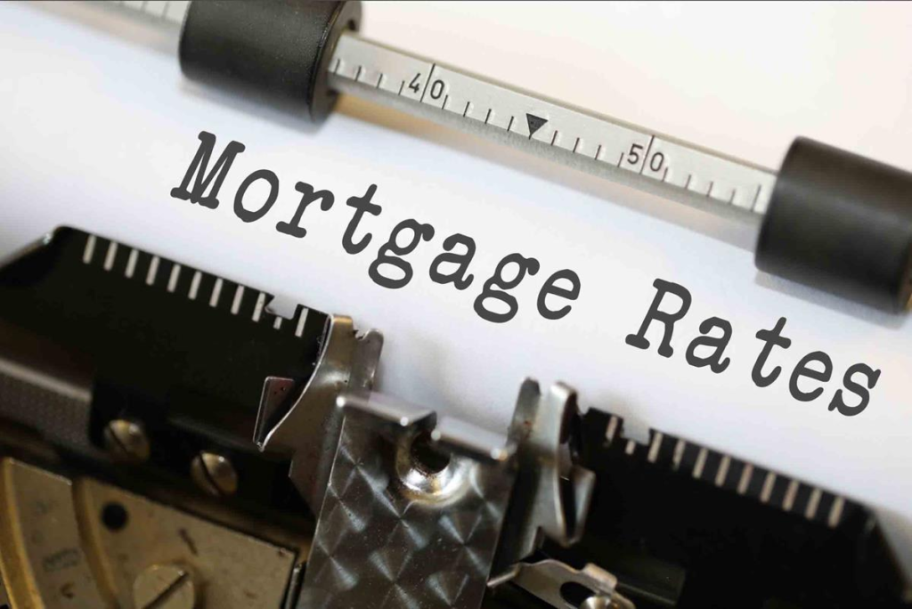 Typing with a neat typewriter headMortgage Rates