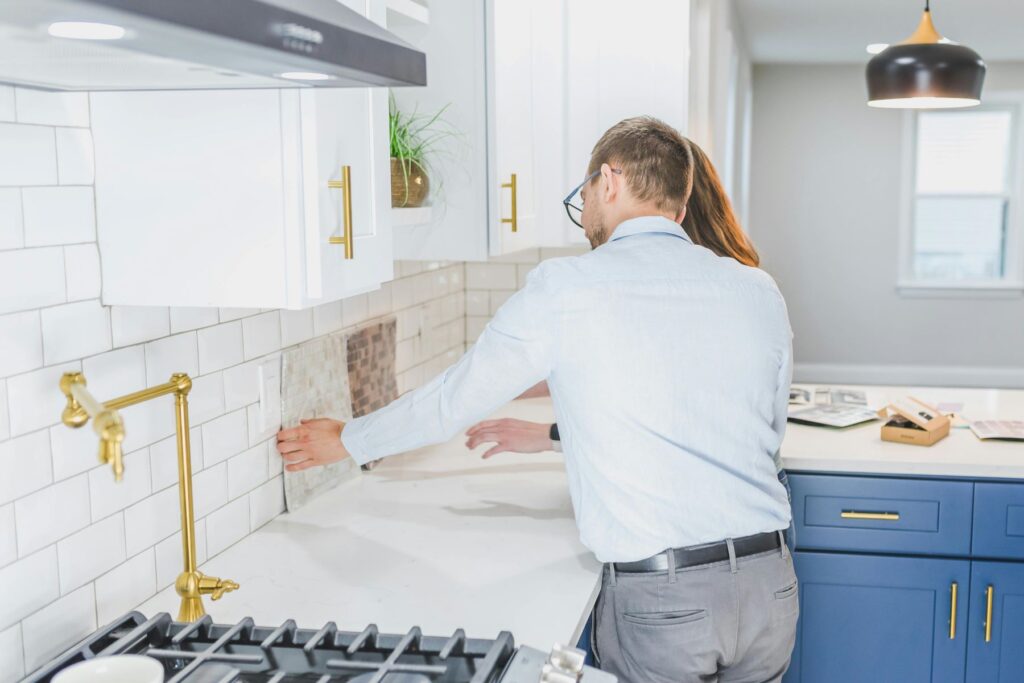 Real estate agent and client inspecting a foreclosed house