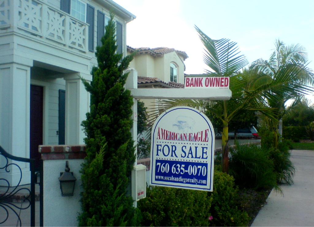 Two adjacent bank-owned foreclosures