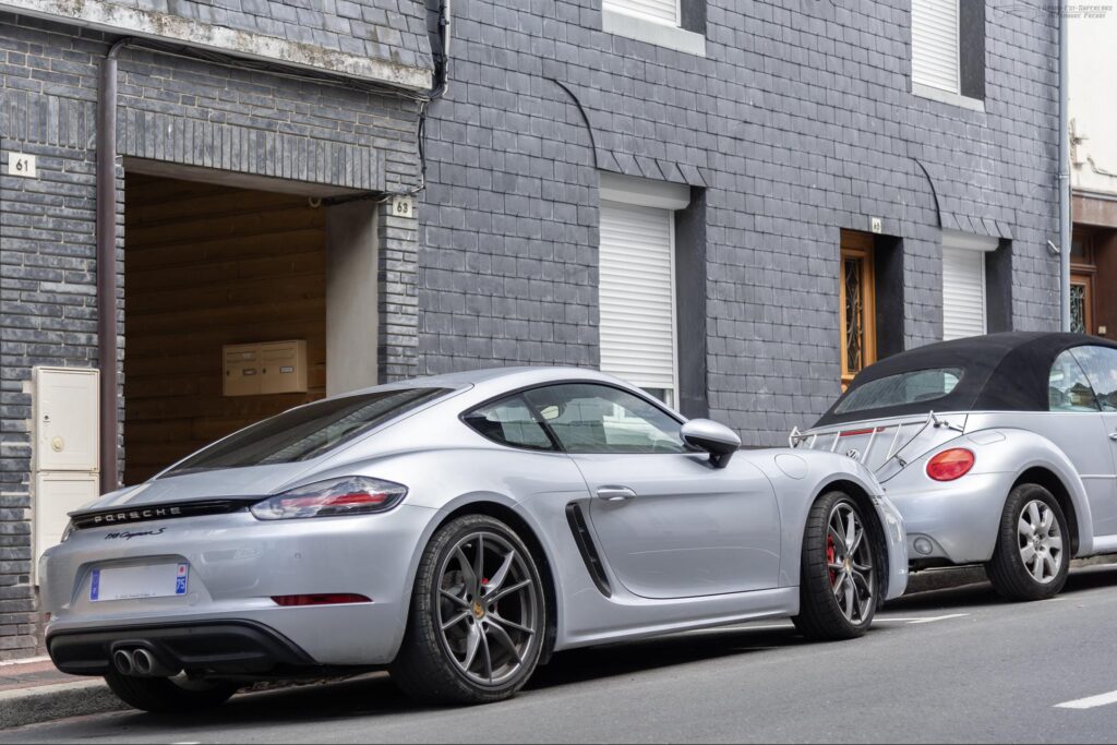 A Porsche sports car parked on the street