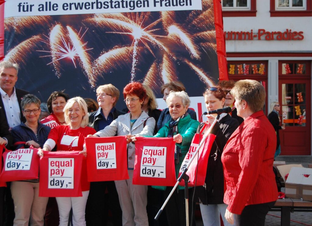 German workers at an equal pay day event
