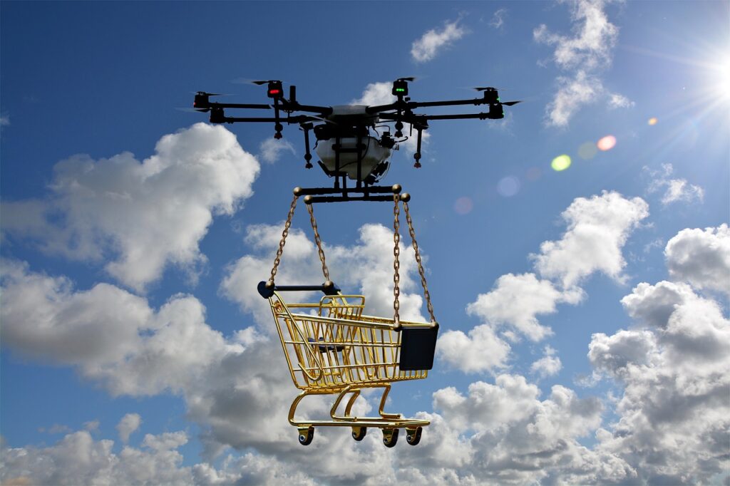 A drone lifting a cart