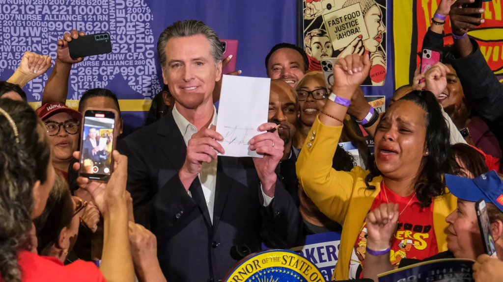 Fast food union workers celebrating Gov. Newsom’s new bill