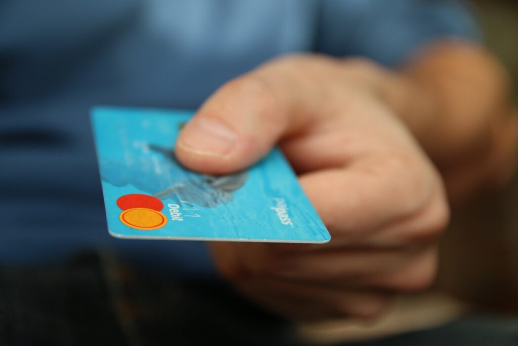 Hand holding a credit card