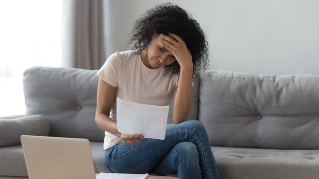 Woman worried about her looming bills