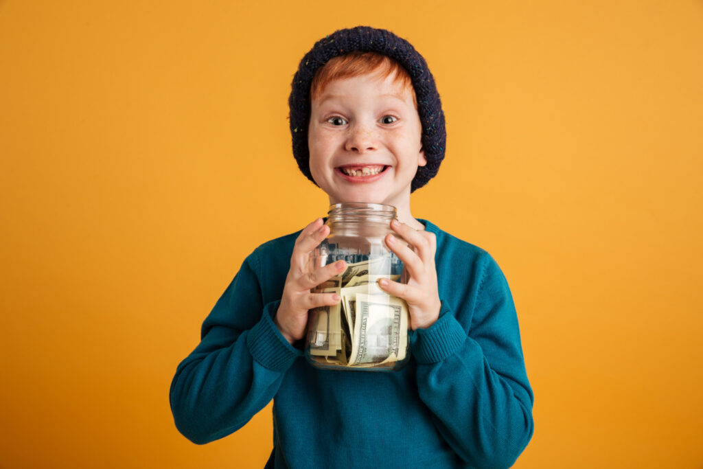 A boy with a money jar