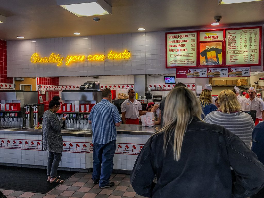 Customers waiting for their order in a fast food restaurant