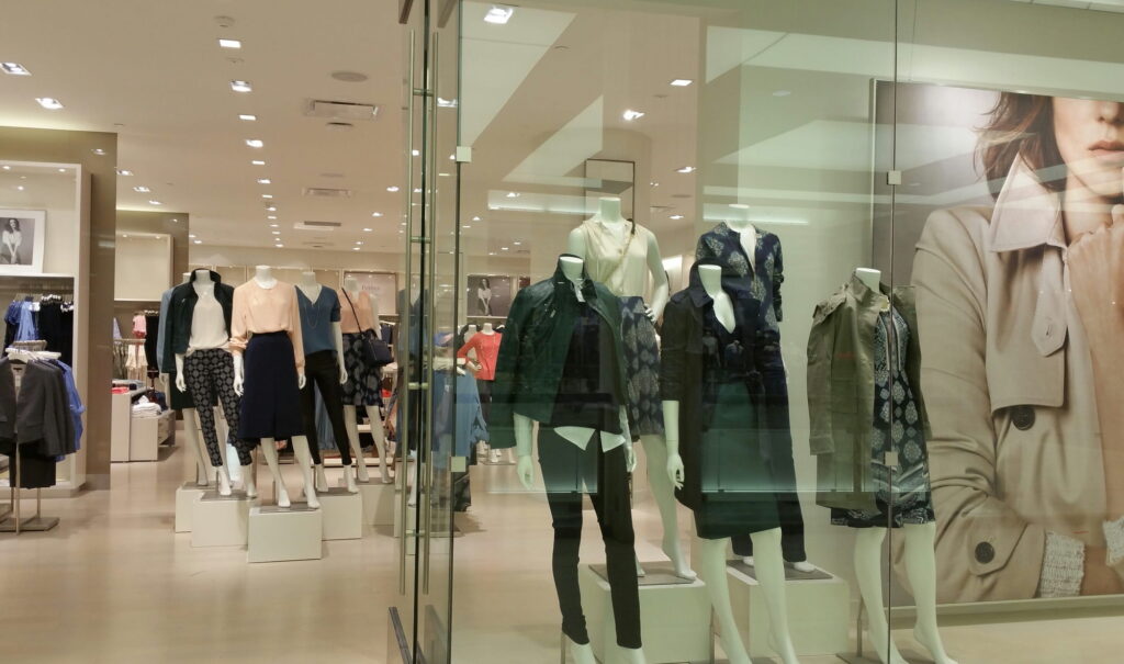 Mannequins with clothes displayed inside a mall