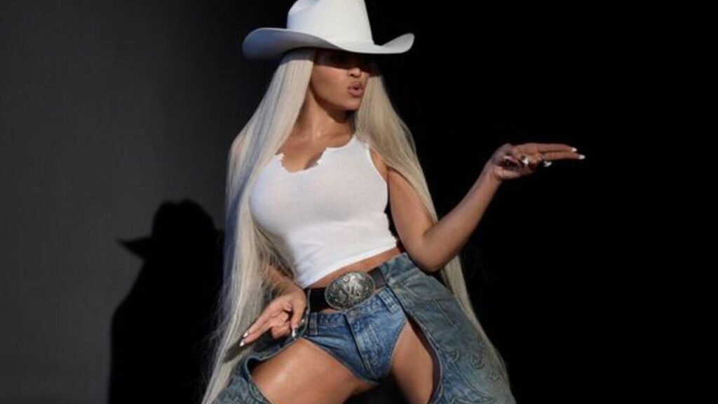 Beyoncé stuns in denim pants, a cowboy hat and a top