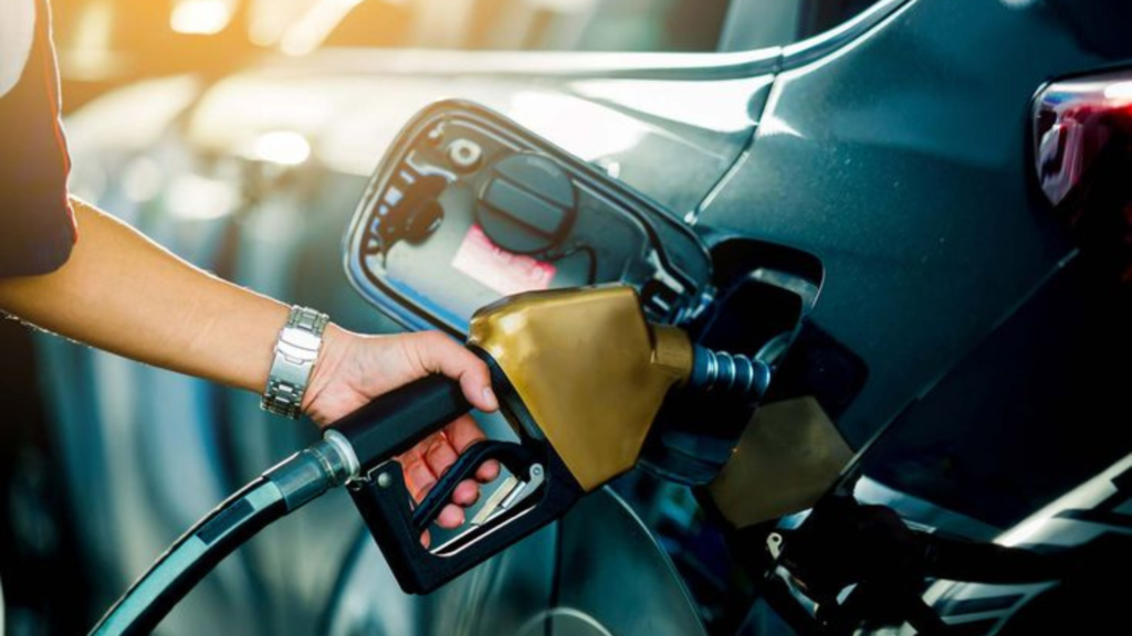 Man filling gas tank