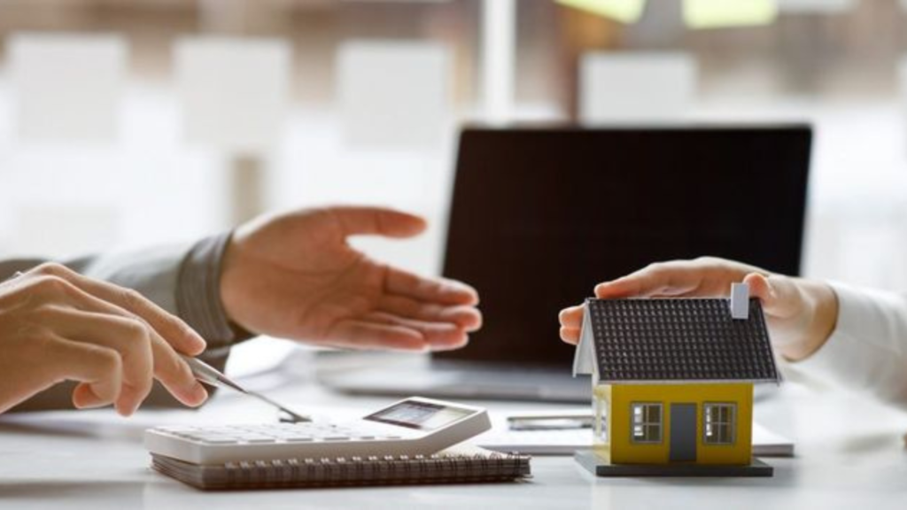 Discussion between two parties with a house model on the table