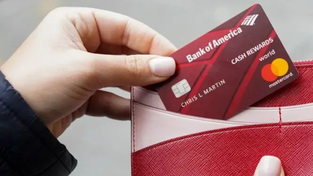 A woman taking out a Bank of America Wallet from her wallet