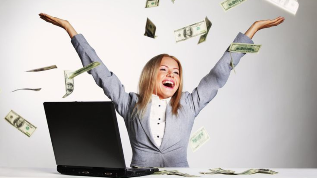 Woman excited with money flying in the air