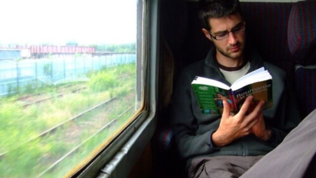 Reading a book on a train