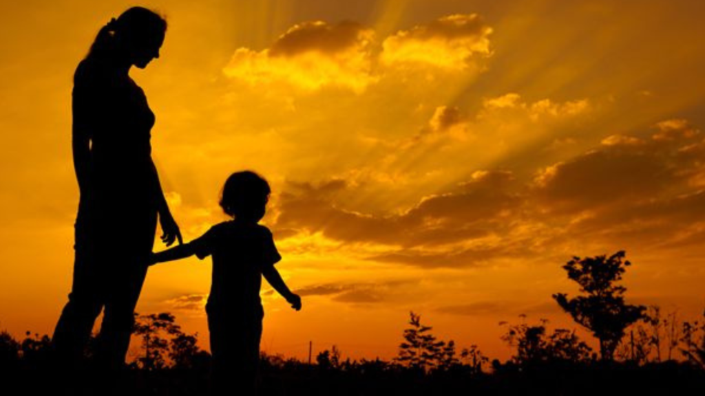 Mother and son in the sunset