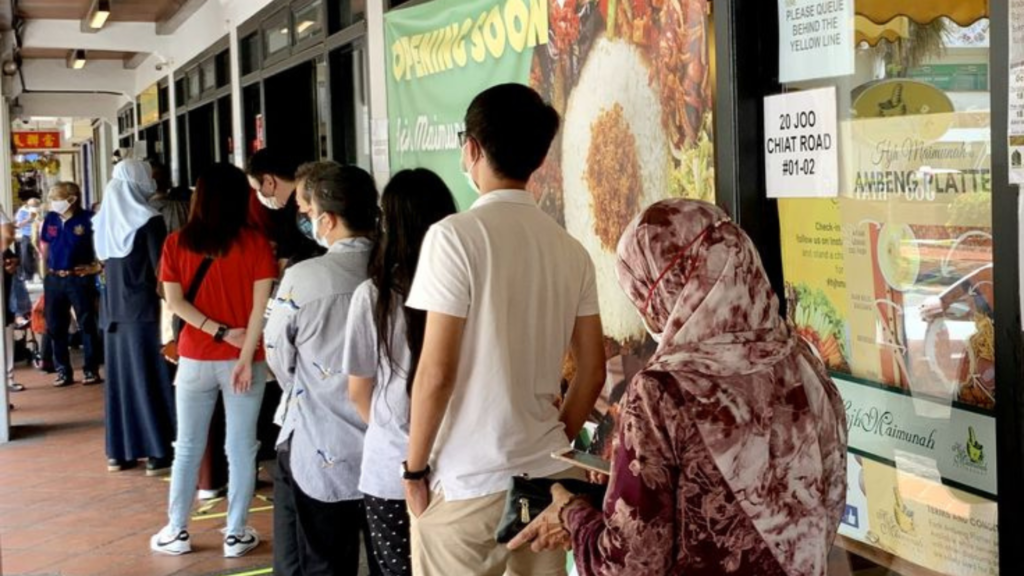 A queue outside a restaurant