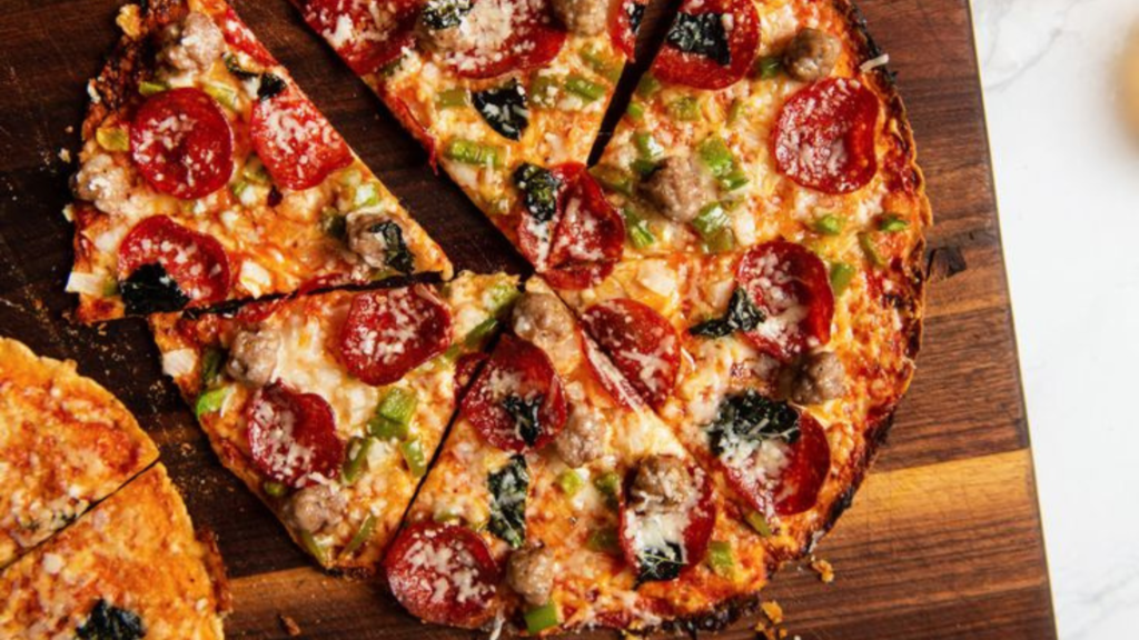 A cut pizza platter on a table