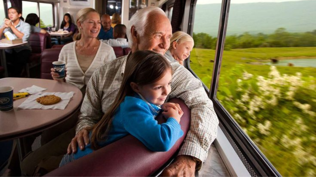 Old couple with grandkids on an ongoing train