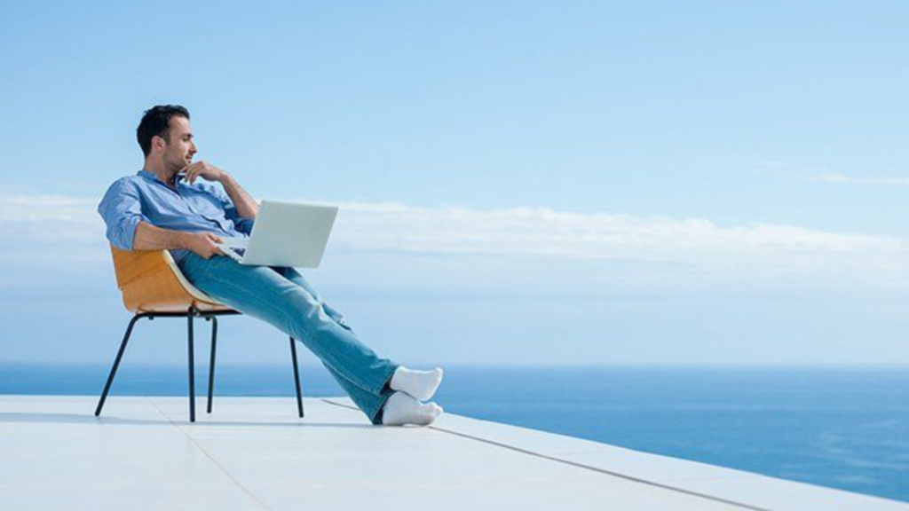 Man sitting with laptop