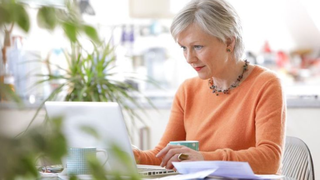 A woman working on laptop