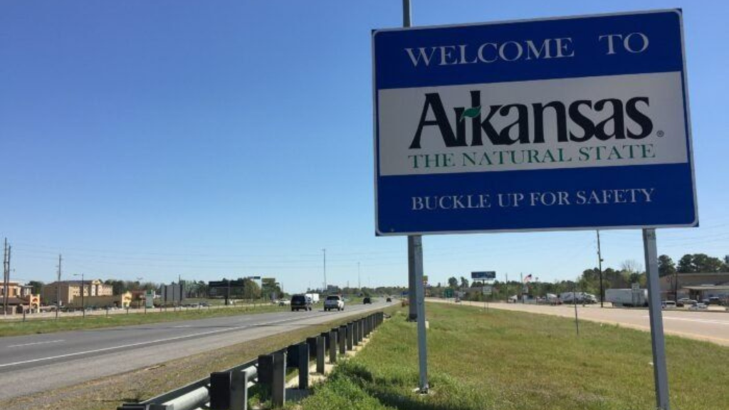 The welcome sign post for Arkansas