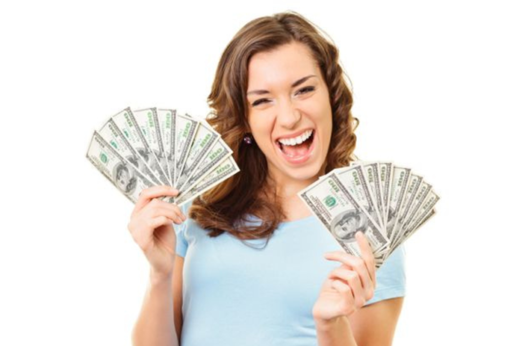 A woman holding some cash